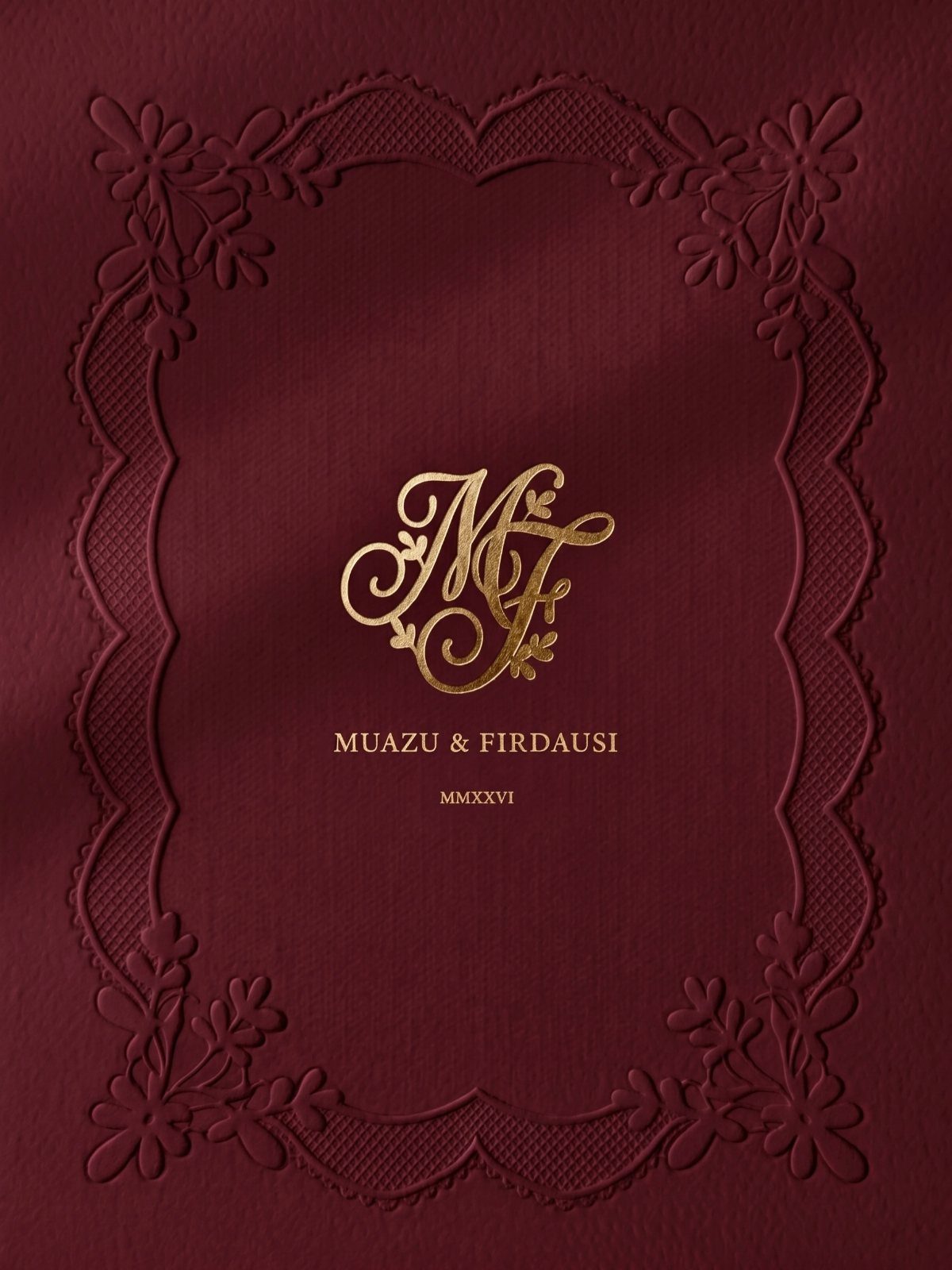 Gold foil wedding monogram with names on deep red textured embossed paper
